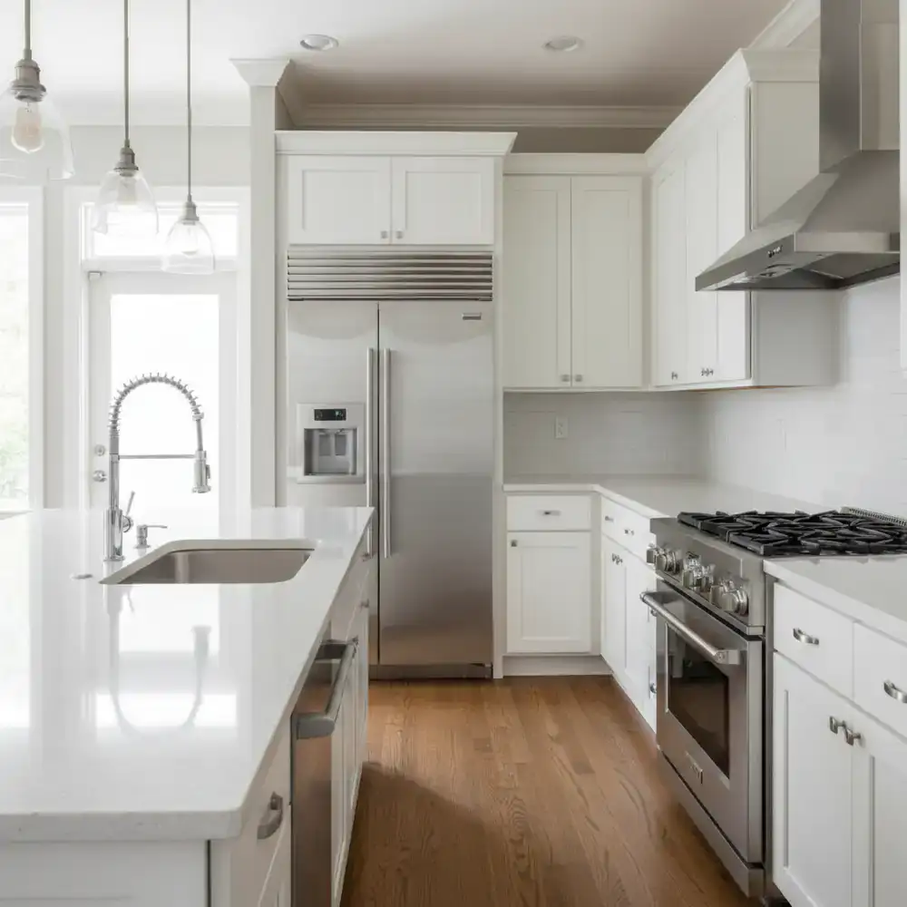 Kitchen with spotless counters and shining appliances after cleaning